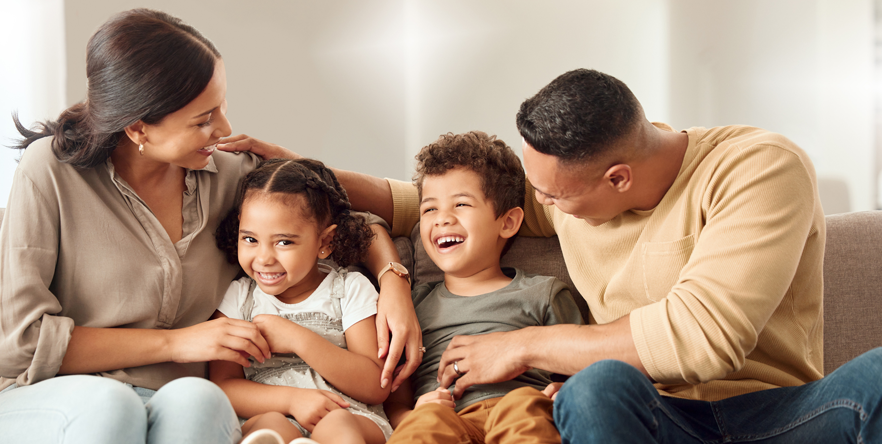 Happy parents with their children